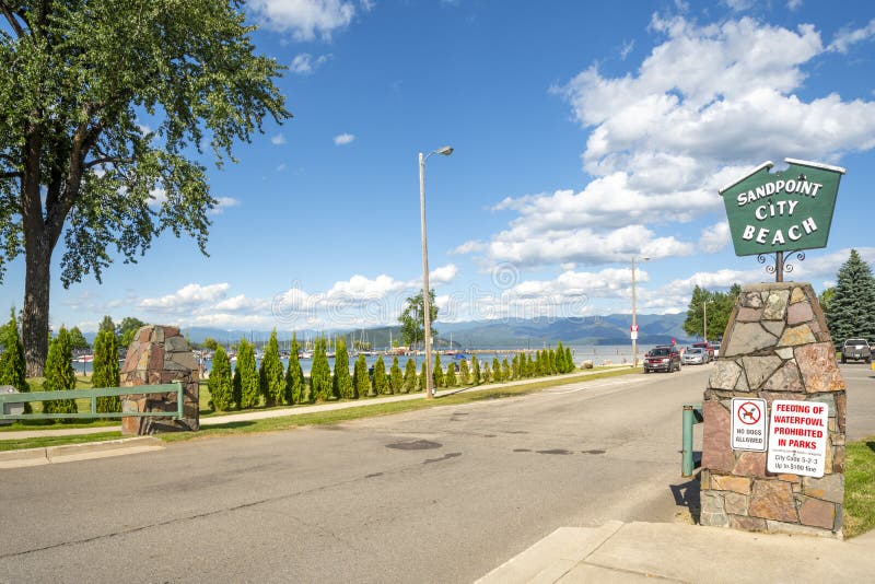 The entrance and sign to the Sandpoint City Beach and park at Sand Creek River and Lake Pend Oreille in Sandpoint, Idaho royalty free stock photos The entrance and sign to the Sandpoint City Beach and park at Sand Creek River and Lake Pend Oreille in Sandpoint, Idaho royalty free stock photos