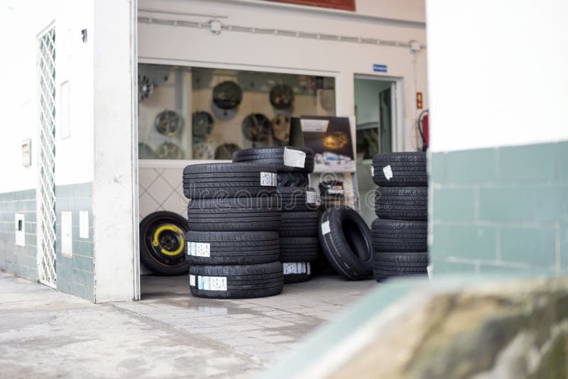 Entrance To Car Mechanic Place With Tires Stock Photo - Image of