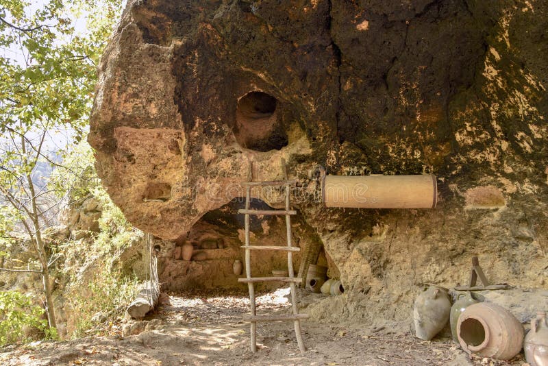 Entrance to the cave in the mountains small house stairs sun mysterious elves fairy tale magic royalty free stock photos Entrance to the cave in the mountains small house stairs sun mysterious elves fairy tale magic royalty free stock photos