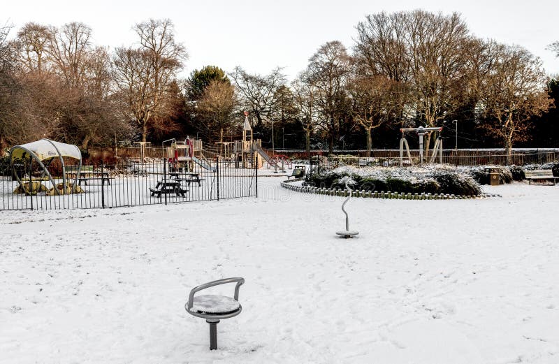 An entrance to children playground covered with snow in Westburn park, Aberdeen, Scotland