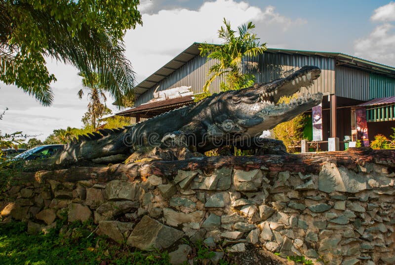 Entrance to the farm, a stuffed crocodile. Sarawak. Borneo. Malaysia