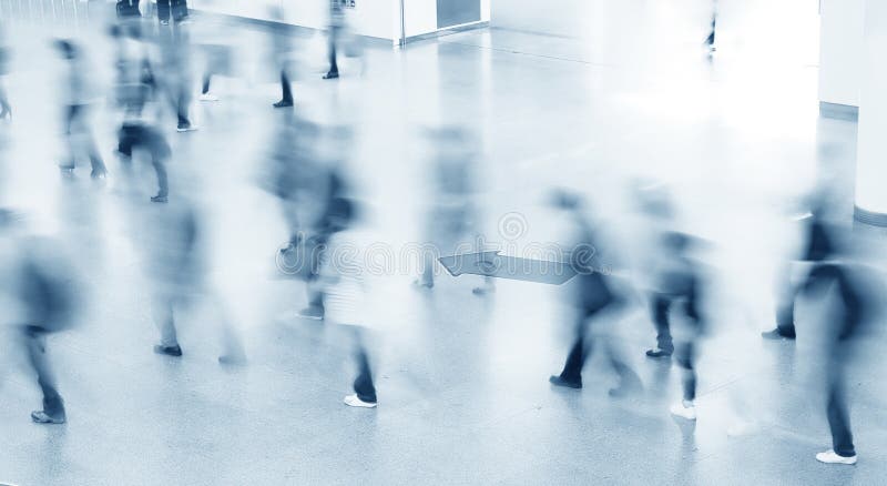 Entrance to modern building and people silhouettes