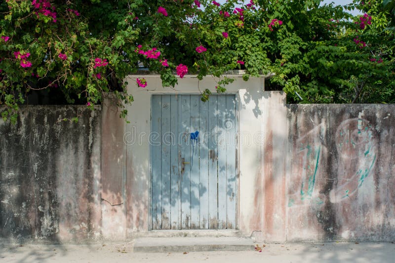 Entrance to the yard of the house in the village at the tropical island