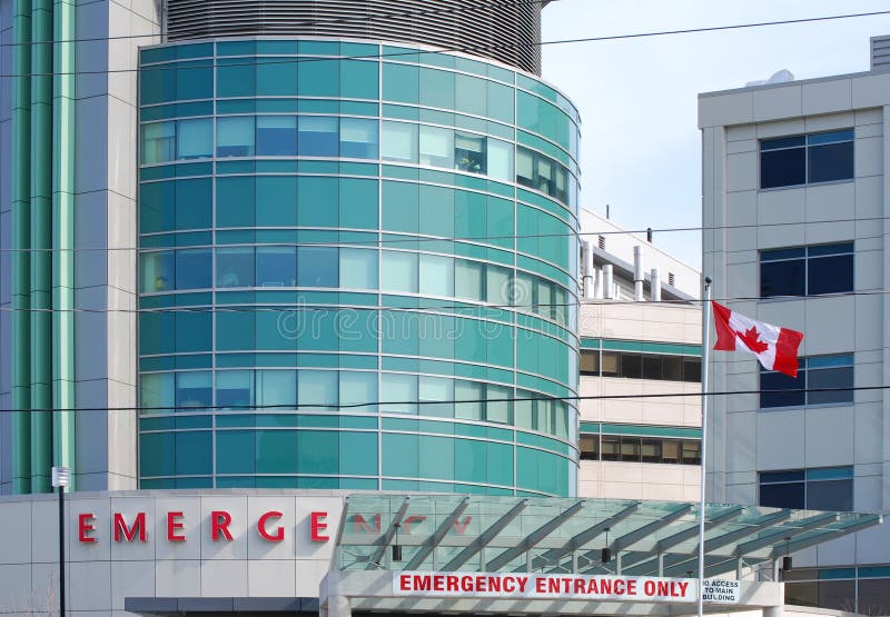 Entrata di emergenza con una bandierina canadese fotografie stock Entrata di emergenza con una bandierina canadese fotografie stock