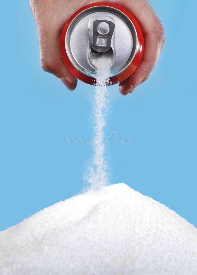 Hand holding soda can pouring a crazy amount of sugar in metaphor of sugar content of a refresh drink isolated on blue background in healthy nutrition, diet and sweet addiction concept. Hand holding soda can pouring a crazy amount of sugar in metaphor of sugar content of a refresh drink isolated on blue background in healthy nutrition, diet and sweet addiction concept