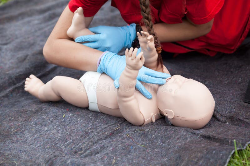 Infant CPR manikin first aid. Cardiopulmonary resuscitation - CPR. Infant CPR manikin first aid. Cardiopulmonary resuscitation - CPR.