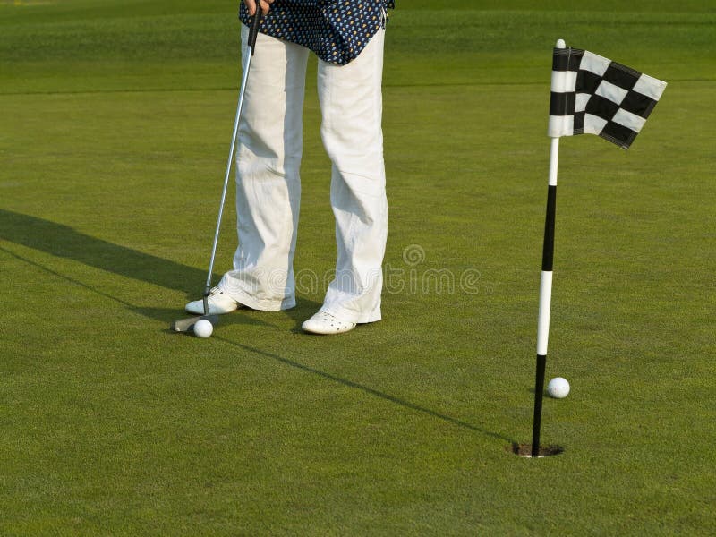 Golf course with ball and flag. Golf course with ball and flag.