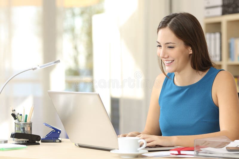 Entrepreneur working with a laptop at office stock photos