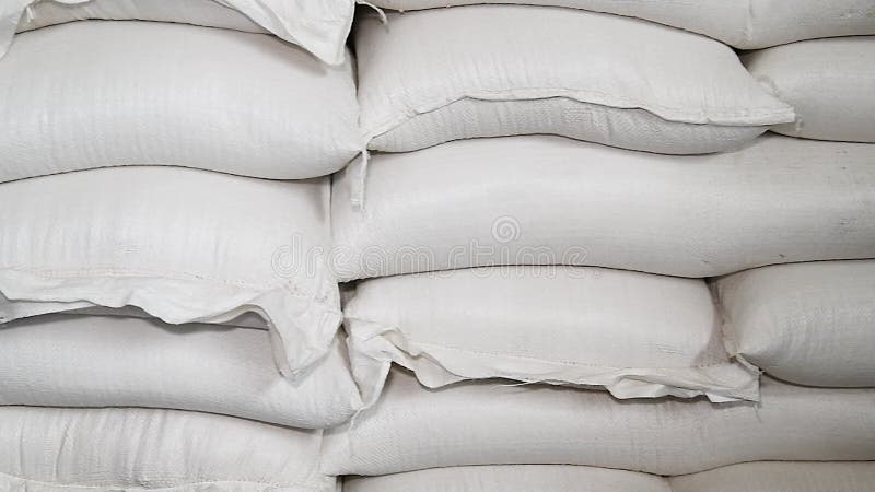 Entrepôt alimentaire. sacs de farine de sucre de riz et autres produits