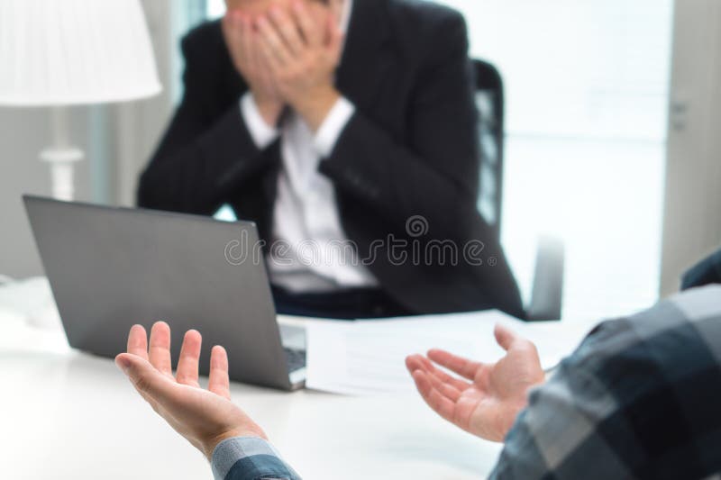 Failed job interview or business people having fight in office. Businessman covering and holding face with hands in meeting. Boss do not want to fire employee. Bad management or working environment. Failed job interview or business people having fight in office. Businessman covering and holding face with hands in meeting. Boss do not want to fire employee. Bad management or working environment