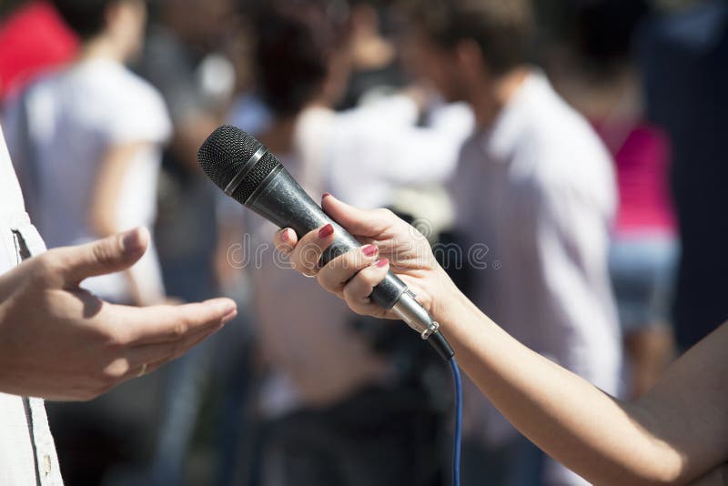 Media interview with the microphone. Media interview with the microphone