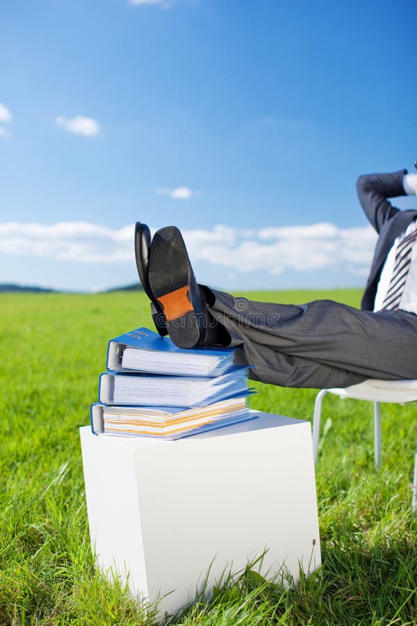 Entspannter Geschäftsmann stockbild Entspannter Geschäftsmann stockbild