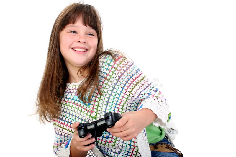 Entzückendes kleines Mädchen, das Videospiele spielt stockbild Entzückendes kleines Mädchen, das Videospiele spielt stockbild