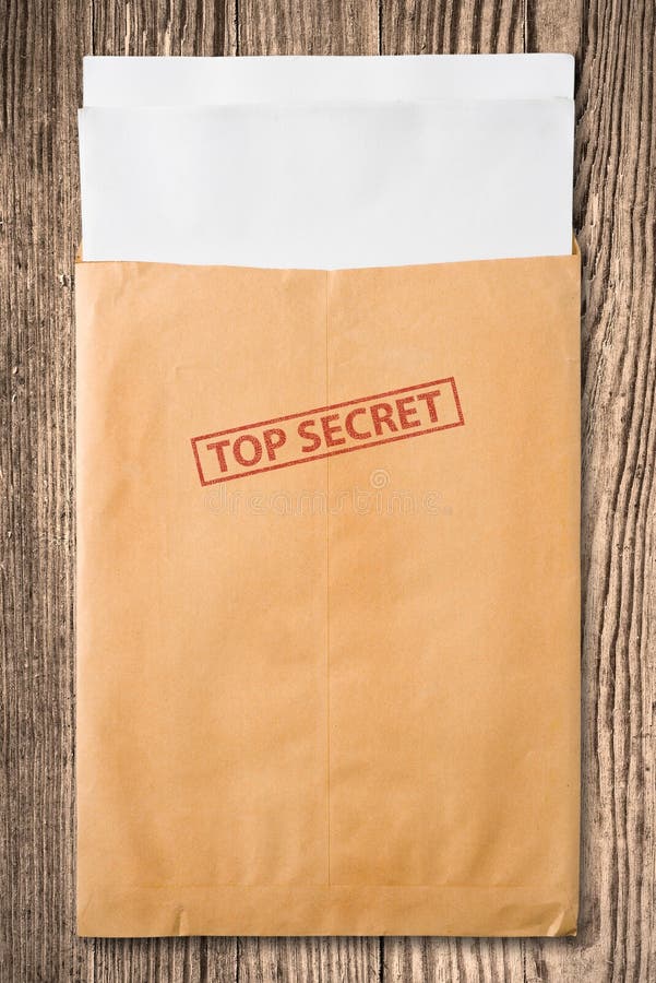 Open yellow envelope with top secret stamp and blank papers, on wooden table, clipping path. Open yellow envelope with top secret stamp and blank papers, on wooden table, clipping path.