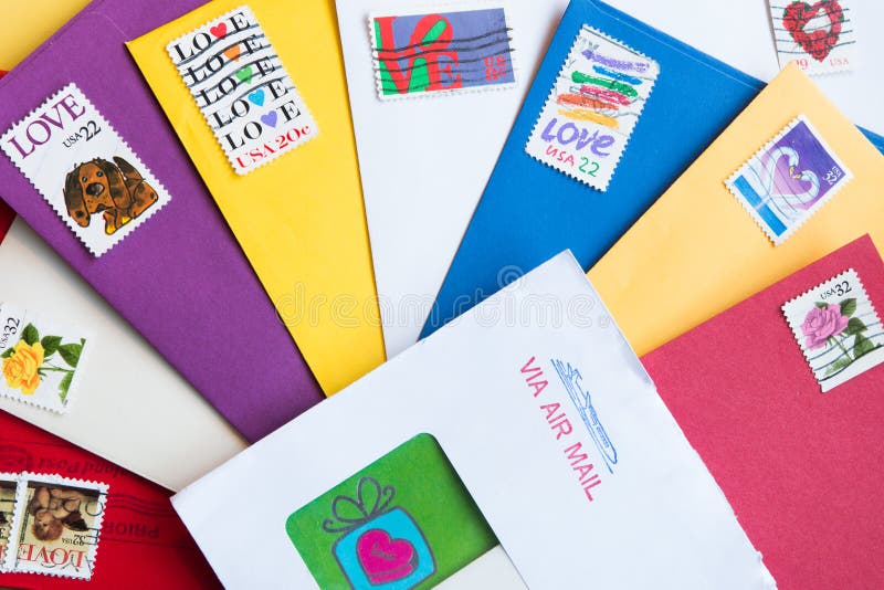 Envelopes of Different Colors with Love Stamps Editorial Stock Photo