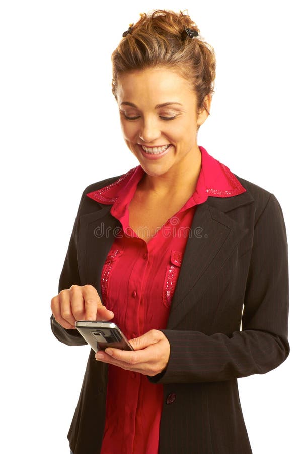 Mulher de negócios bonita a enviar mensagens de texto fotografia de stock