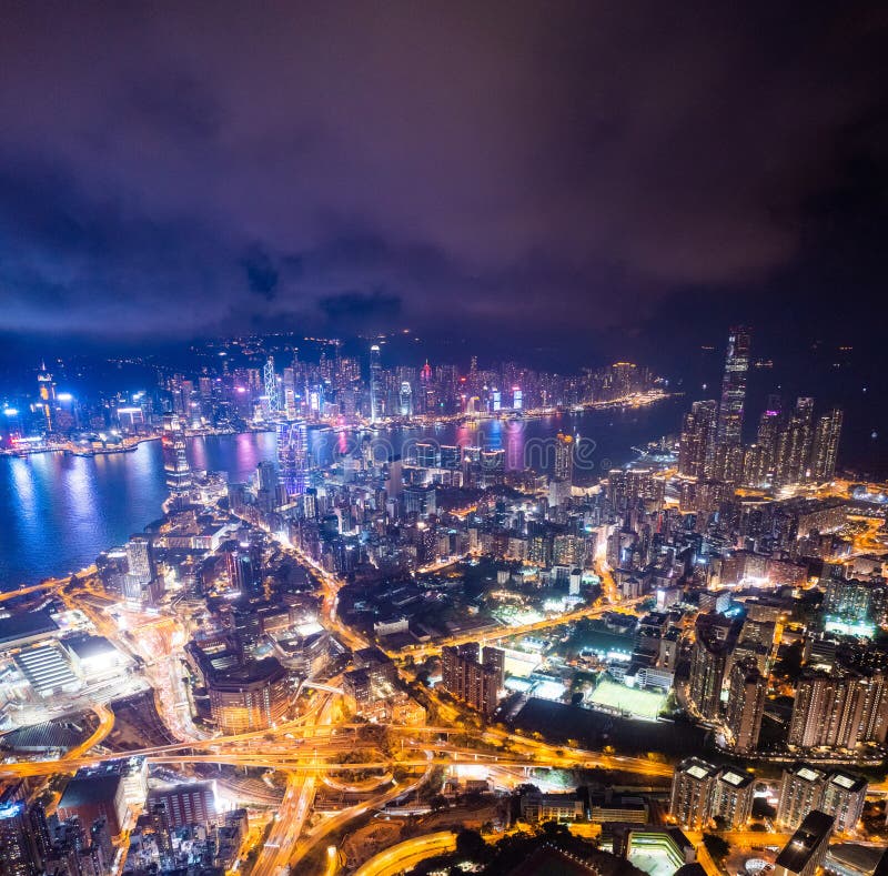 Epic Aerial View of Night Scene of Victoria Harbour, Hong Kong Stock
