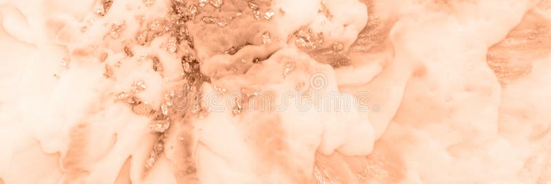 Epoxy resin paint, abstract background. Demonstrating the colors of 2024 - Peach Fuzz. royalty free stock photography