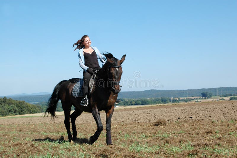 Equestrienne and horse.