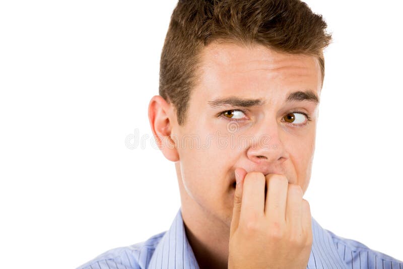 equipaggi il morso delle sue unghie e lo sguardo al lato con un bisogno per qualcosa o ansioso immagine stock libera da diritti equipaggi il morso delle sue unghie e lo sguardo al lato con un bisogno per qualcosa o ansioso immagine stock libera da diritti