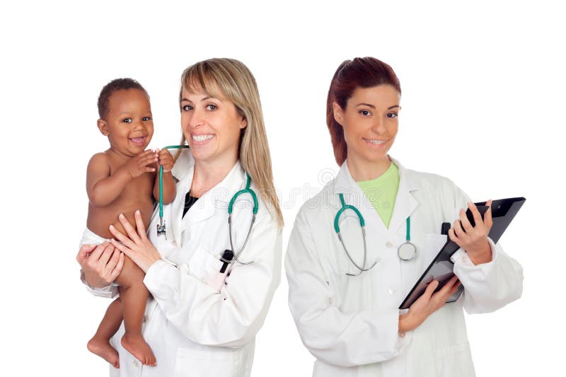 Equipo médico pediátrico con uno de sus pacientes imágenes de archivo libres de regalías Equipo médico pediátrico con uno de sus pacientes imágenes de archivo libres de regalías