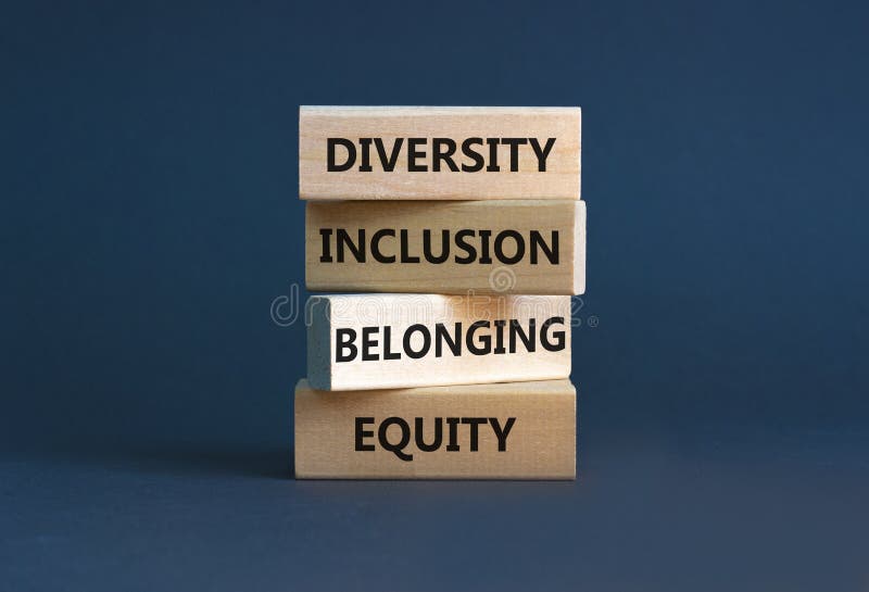 Equity, diversity, inclusion and belonging symbol. Wooden blocks with words `equity, diversity, inclusion, belonging` on beautif