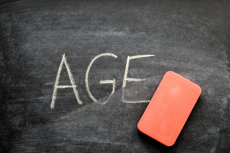 Erasing age, hand written word on blackboard being erased concept