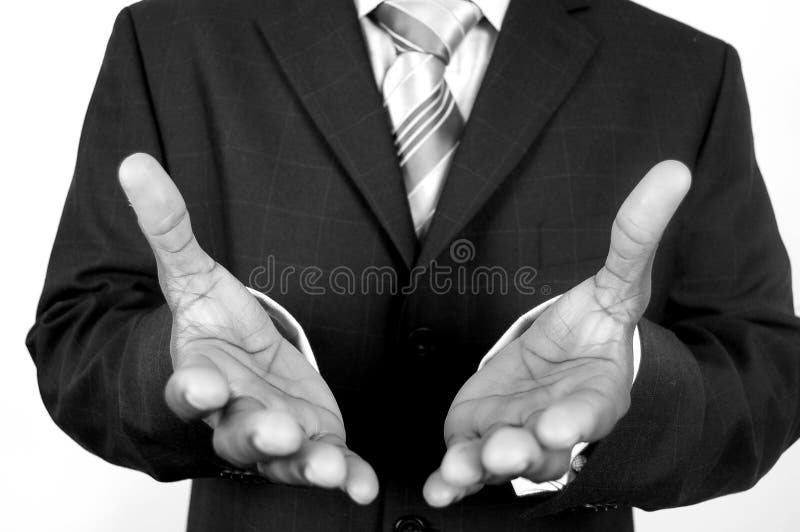 This is an image of black business man offering his hands. (Please let me know where the image will be used by leaving a message in the Comments Section/See Portfolio). This is an image of black business man offering his hands. (Please let me know where the image will be used by leaving a message in the Comments Section/See Portfolio)