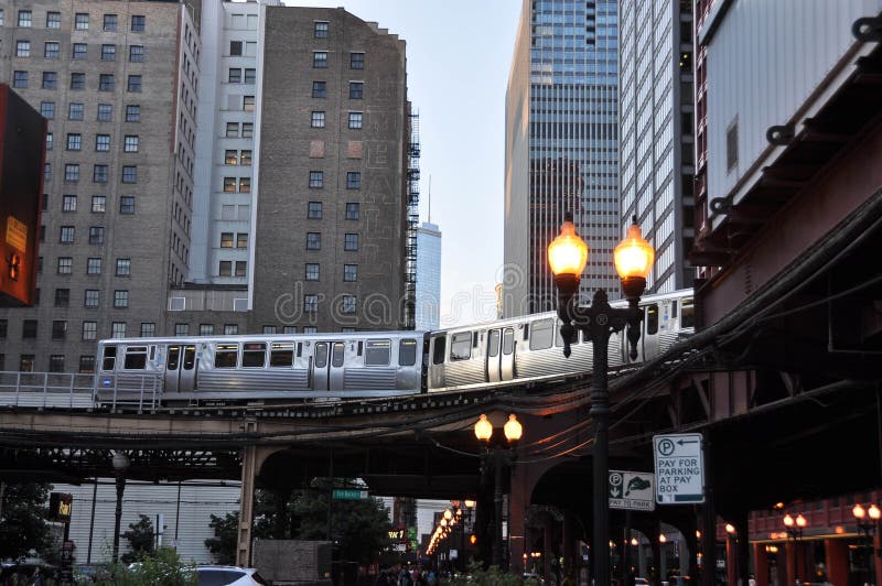 Chicago,Illinois,USA - August 13, 2013 : The train of Chicago L approaching Van Buren Street in the Loop. Chicago,Illinois,USA - August 13, 2013 : The train of Chicago L approaching Van Buren Street in the Loop