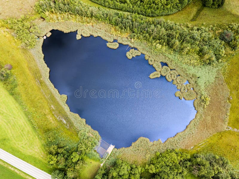 Erial image of a pond with floating turf mats stock images