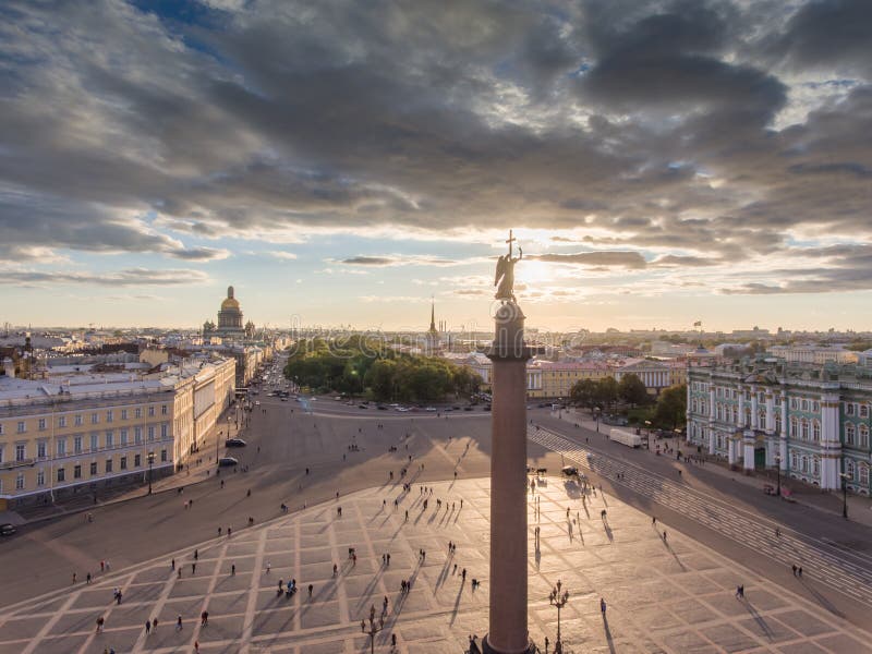 erial view of Palace Square and Alexandr Column at sunset, a gold dome of St. Isaac&x27;s Cathedral, golden spire of