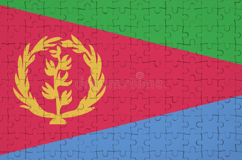Eritrea flag is depicted on a folded puzzle royalty free stock photos