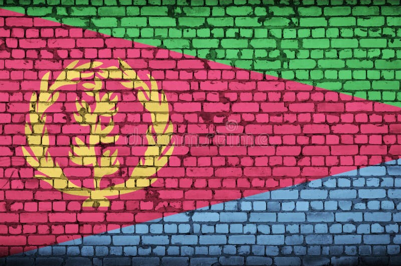 Eritrea flag is painted onto an old brick wall stock image