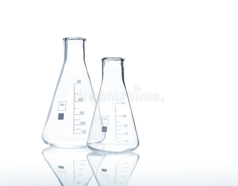 Two empty conical Erlenmeyer flasks with reflection on the surface of the table, isolated. Two empty conical Erlenmeyer flasks with reflection on the surface of the table, isolated