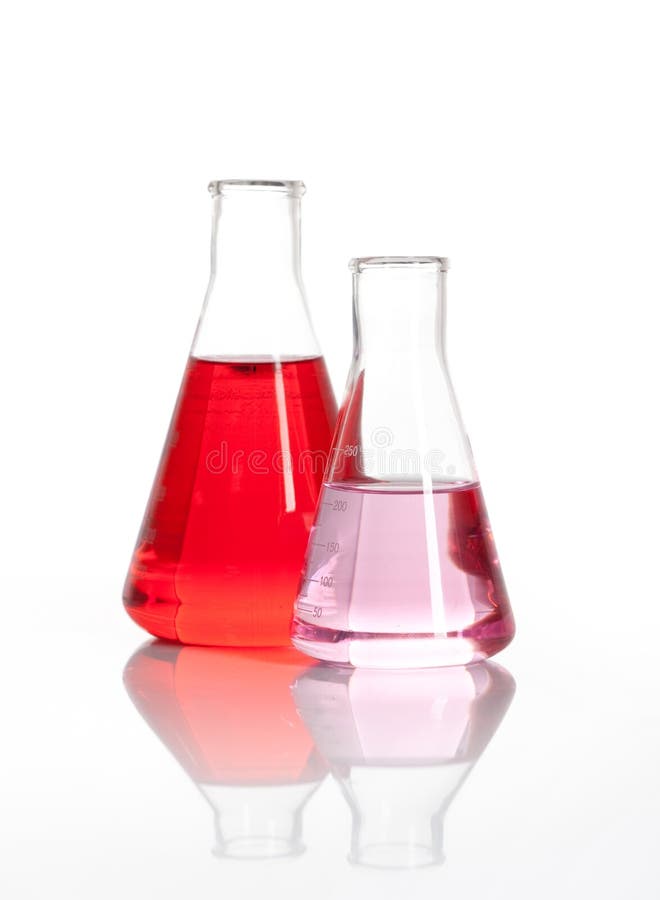 Two Erlenmeyer laboratory flasks with red colored chemical reagent, isolated. Two Erlenmeyer laboratory flasks with red colored chemical reagent, isolated