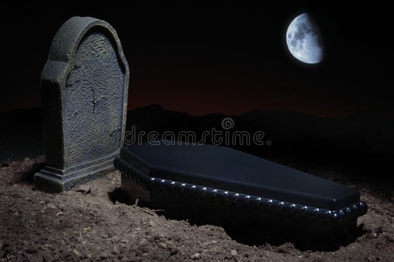 Grave site at night time with casket, headstone and moon in the sky. Grave site at night time with casket, headstone and moon in the sky