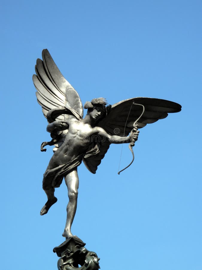 The aluminium statue of Eros the greek mythological God Of Love, stands at the top of The Shaftesbury Memorial Fountain in London's Piccadilly Circus. The aluminium statue of Eros the greek mythological God Of Love, stands at the top of The Shaftesbury Memorial Fountain in London's Piccadilly Circus