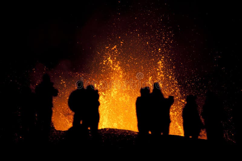 Volcano Eruption in Iceland, Fimmvorduhals. This eruption is between Eyjafjallajokull and Myrdalsjokull. Unrecognisable people standing few hundreds meters away watching the eruption. See my other pictures from volcano eruptions here and more pictures from Iceland here. Volcano Eruption in Iceland, Fimmvorduhals. This eruption is between Eyjafjallajokull and Myrdalsjokull. Unrecognisable people standing few hundreds meters away watching the eruption. See my other pictures from volcano eruptions here and more pictures from Iceland here.