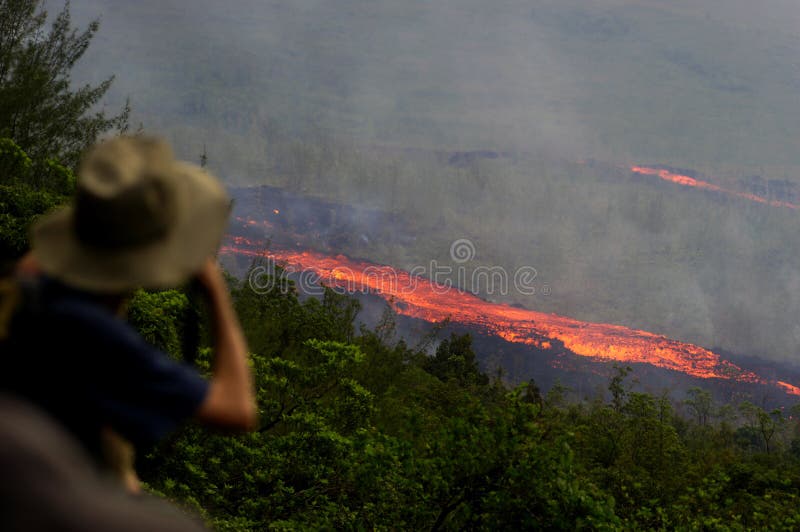 Lava is crossing the national road near Saint-Philippe village. Lava is crossing the national road near Saint-Philippe village