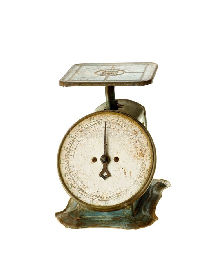 Antique green and rust household weight scale with round dial, numbers going up to 20 pounds. isolated on white. Antique green and rust household weight scale with round dial, numbers going up to 20 pounds. isolated on white.