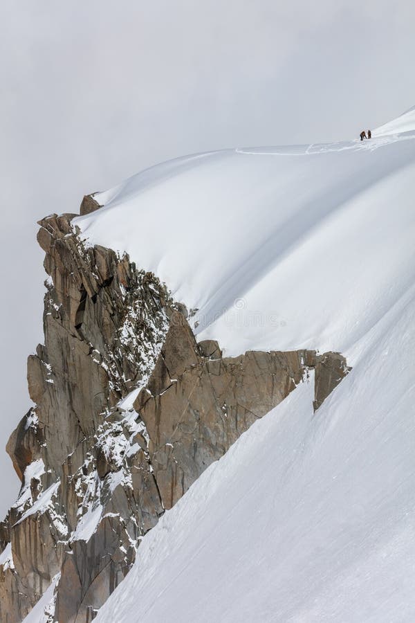 Escaladores en el macizo de Mont Blanc, Francia foto de archivo Escaladores en el macizo de Mont Blanc, Francia foto de archivo