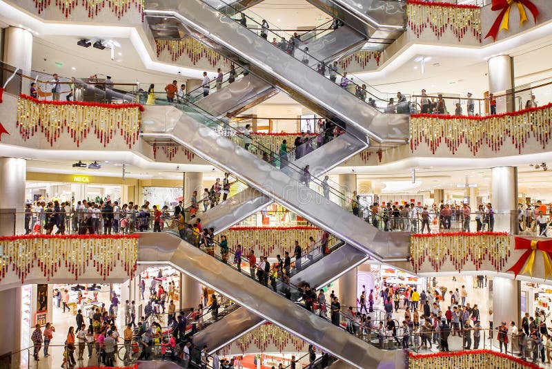 Escalators, busy mall