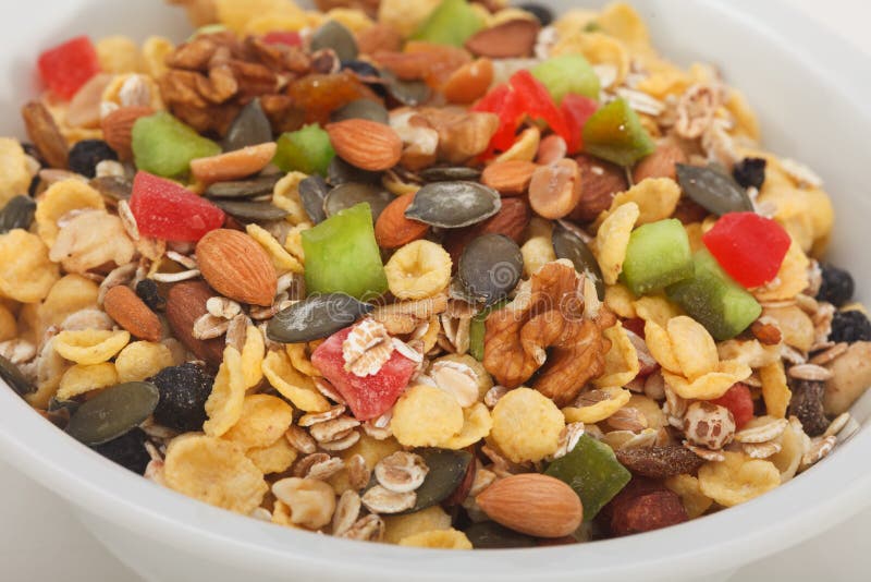 Escamas Nuts de los cereales de la pasa de la avena de las frutas secas de Muesli imágenes de archivo libres de regalías Escamas Nuts de los cereales de la pasa de la avena de las frutas secas de Muesli imágenes de archivo libres de regalías