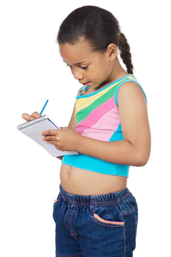 Menina adorável a escrever imagem de stock royalty free