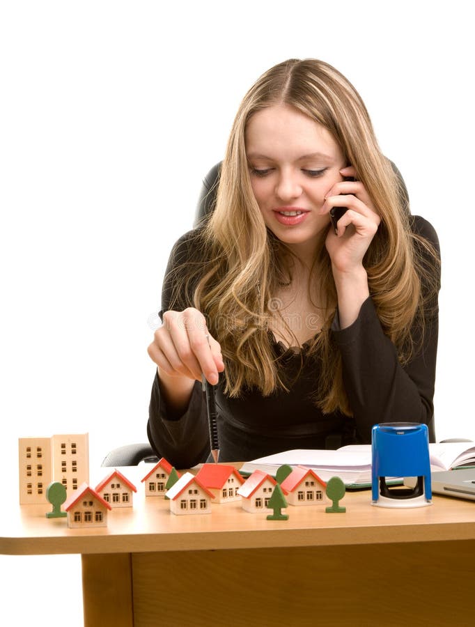 Jovem empresária a escrever num caderno imagem de stock