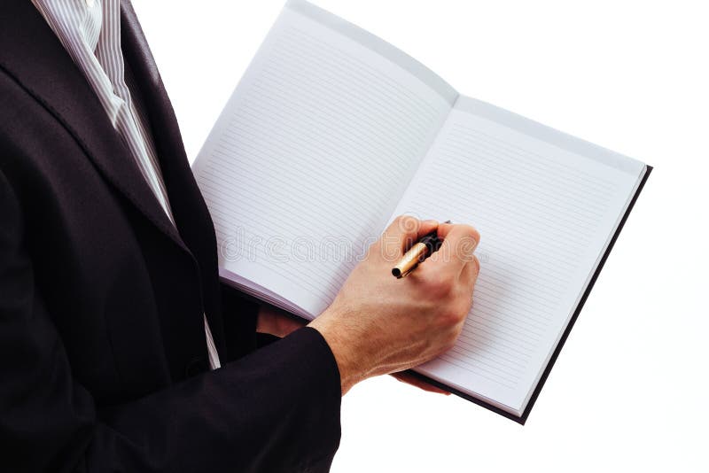 Escritura de la mano del hombre de negocios con la pluma fotos de archivo Escritura de la mano del hombre de negocios con la pluma fotos de archivo