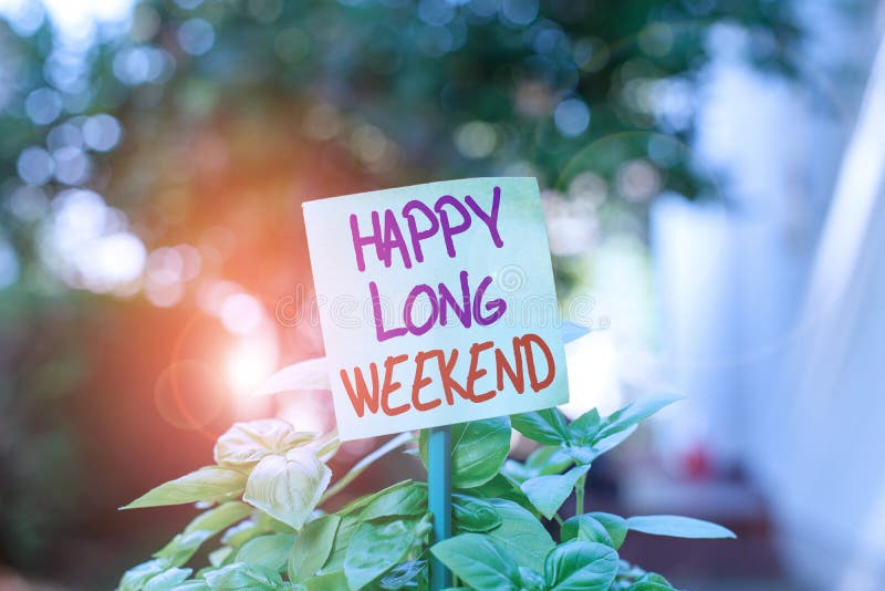 Escritura a mano de texto Feliz fin de semana largo Concepto que significa desear a alguien unas vacaciones felices Viajar a la l fotografía de archivo libre de regalías