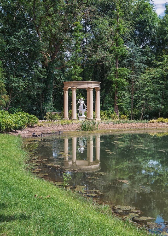 Artemis Sculpture in the garden of English style, Mondo Verde Park, Netherlands. Artemis Sculpture in the garden of English style, Mondo Verde Park, Netherlands.