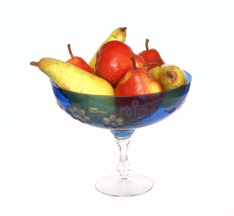 Escuro - vaso de vidro azul com fruta fotografia de stock Escuro - vaso de vidro azul com fruta fotografia de stock