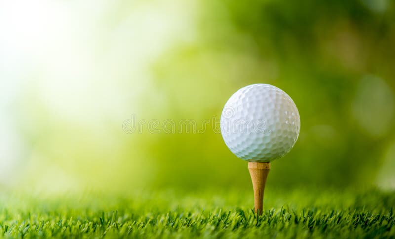 Golf ball on tee ready to play. Golf ball on tee ready to play